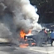 Illustration for article titled VIDEO: Mystery Good Samaritans Pull Man Out Of Fiery Car Wreck